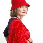 Exalted Queen Mother Sue Ellen is the founder of the Red Hat Society. sue-ellen