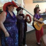 Lyrical Laurie led the choir at Kalama Heights and Naughty Nancy played the bells while Jazzy Judy sang along
